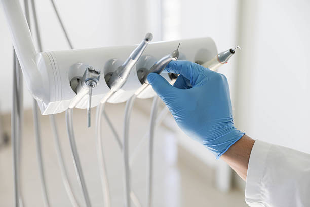 Professional Root Canal Treatment technician working in Linn, MO